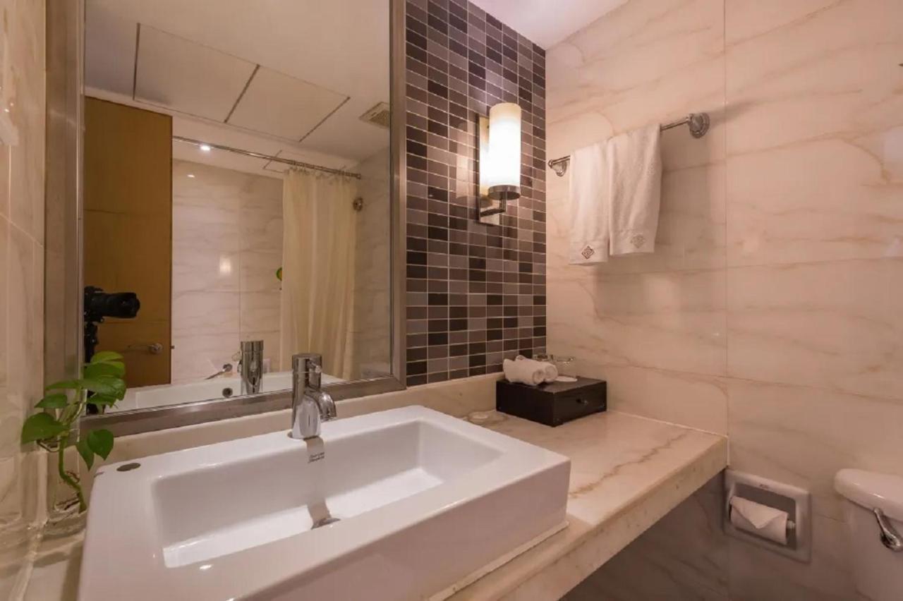 ננג'ינג Shu Guang International Hotel מראה חיצוני תמונה