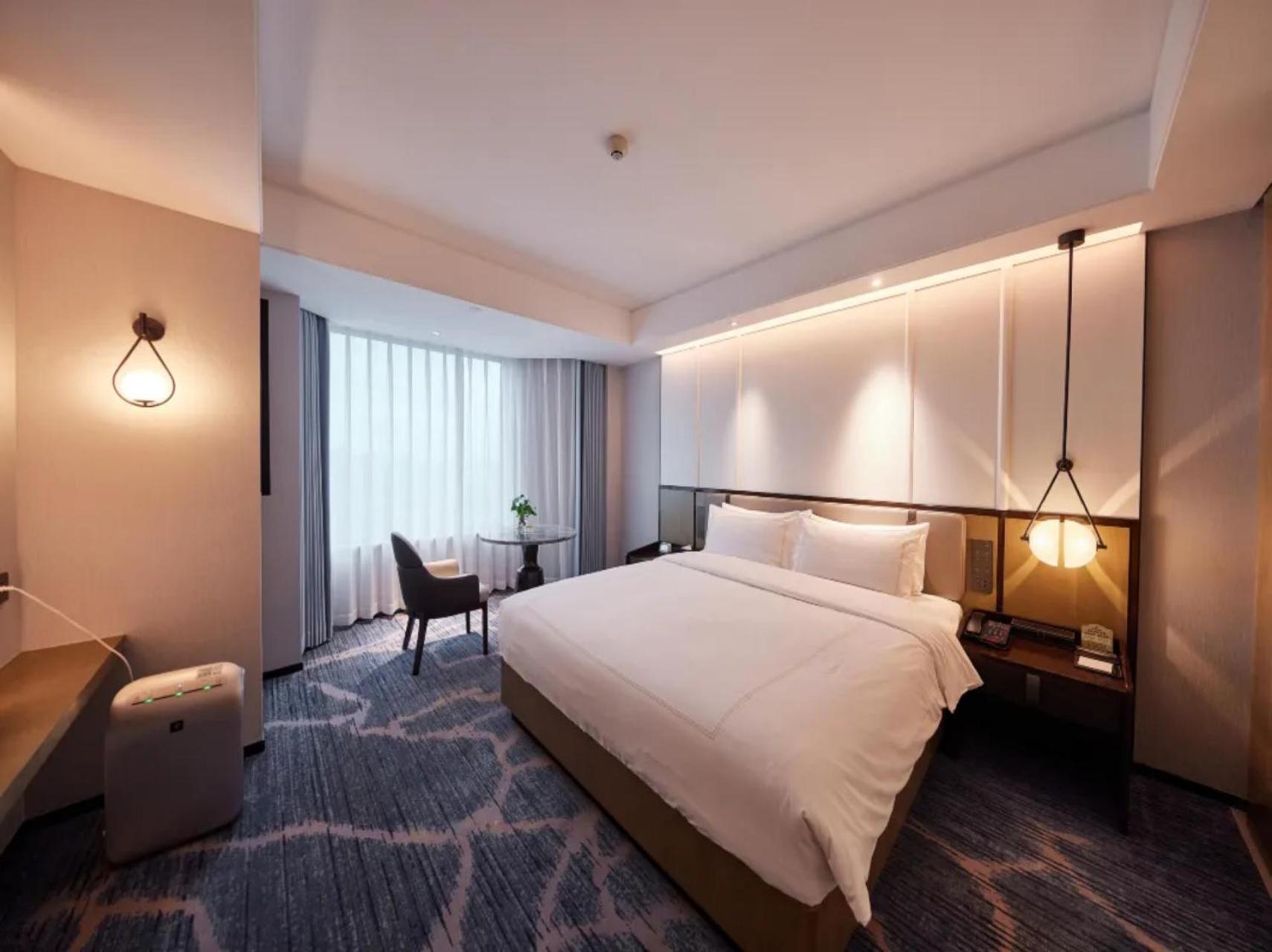 ננג'ינג Shu Guang International Hotel מראה חיצוני תמונה