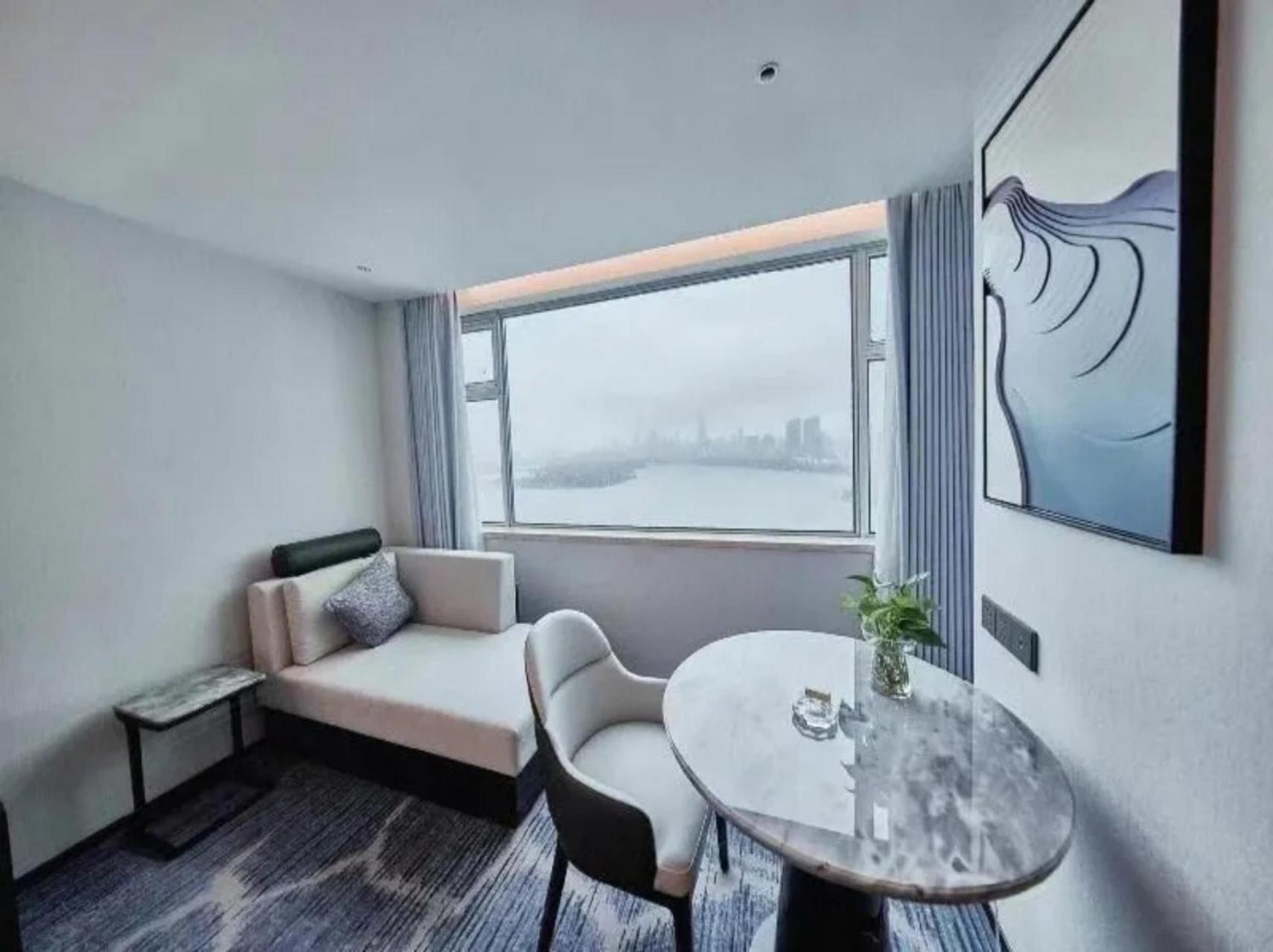 ננג'ינג Shu Guang International Hotel מראה חיצוני תמונה