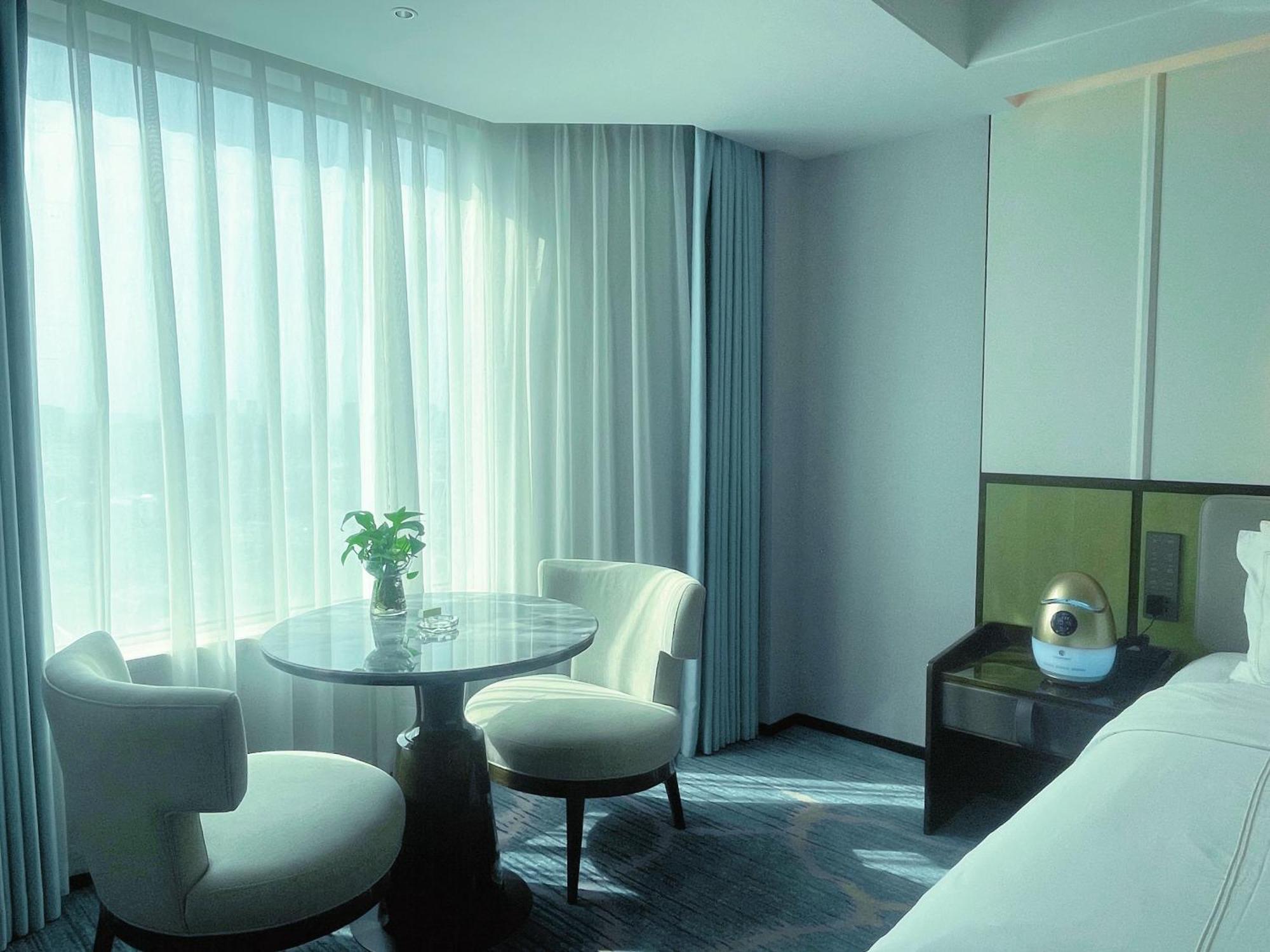 ננג'ינג Shu Guang International Hotel מראה חיצוני תמונה