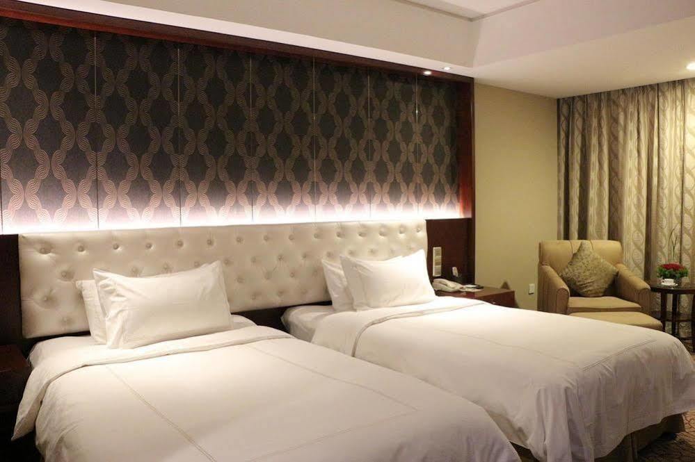 ננג'ינג Shu Guang International Hotel מראה חיצוני תמונה